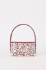 [color:burgundy] A burgundy leather handbag covered in white and cream buttons, featuring a matching burgundy top handle, set against a plain white background.
