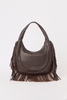 [color: chocolate leather] A dark brown leather crescent-shaped shoulder bag with long fringe detailing along the bottom and sides, set against a plain white background.
