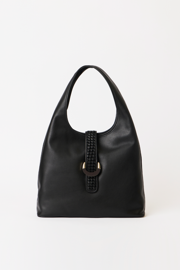 [color:black] A black leather hobo-style shoulder bag with a braided strap detail and a gold-tone circular buckle, photographed against a plain white background.