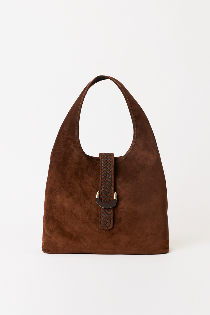 [color: chocolate] A brown suede hobo-style shoulder bag with a wide top handle and a vertical braided strap detail with a gold-tone ring clasp, shown on a plain white background.