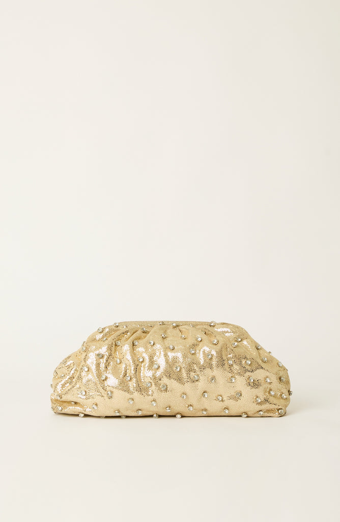 A gold metallic clutch purse with a textured, crinkled surface and small rhinestone embellishments, set against a plain off-white background.