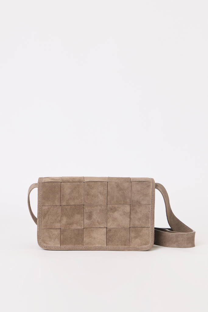 [color:stone suede] A taupe woven leather shoulder bag with a grid pattern and a matching adjustable strap, shown against a plain white background.